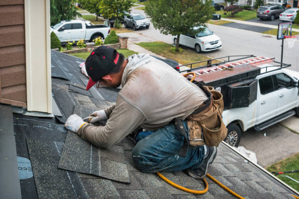 Professional Roof Replacement technician working in Entriken, PA
